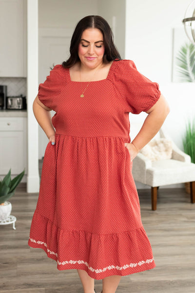 Plus size red dress with a square neck and pockets