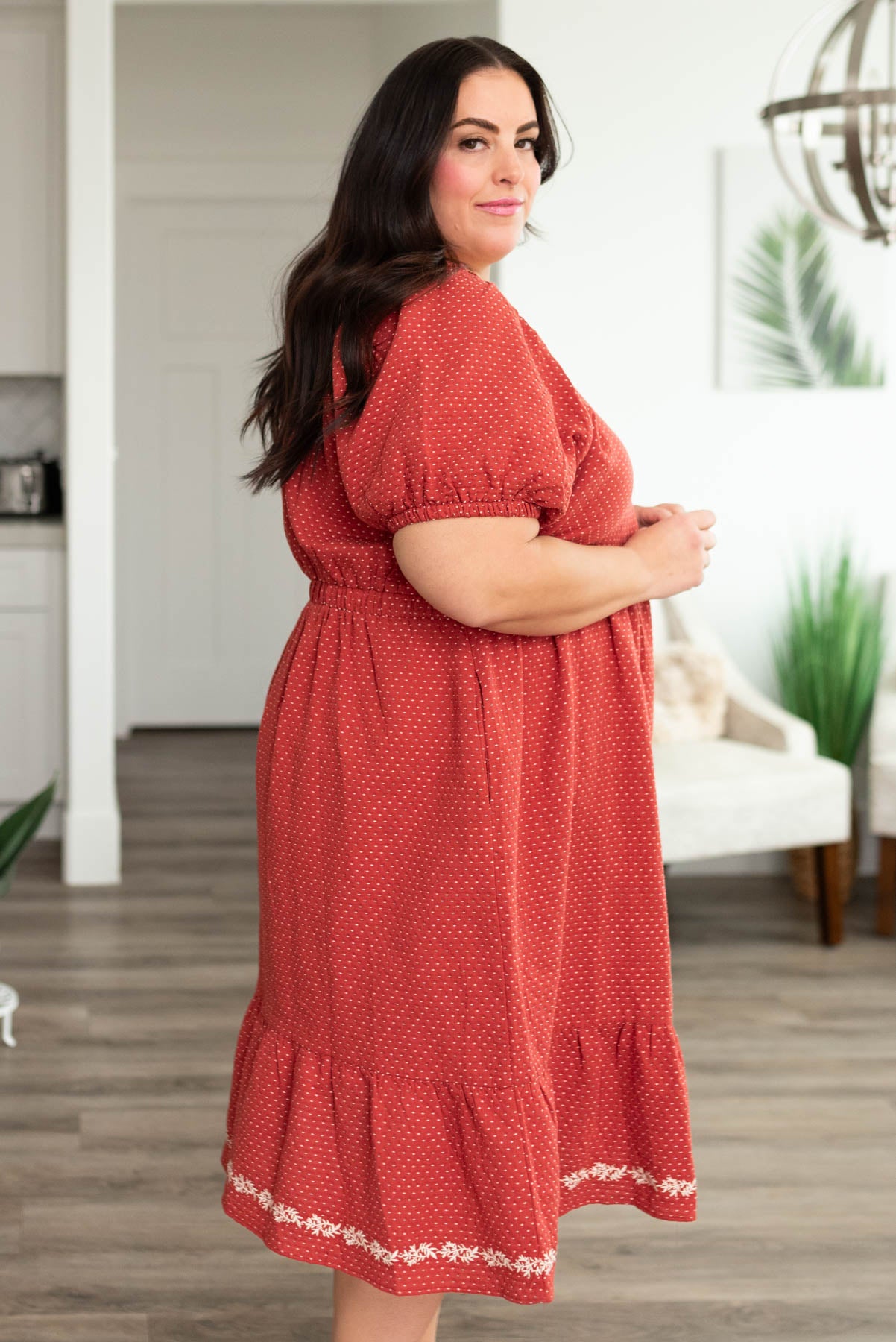 Side view of a plus size red dress