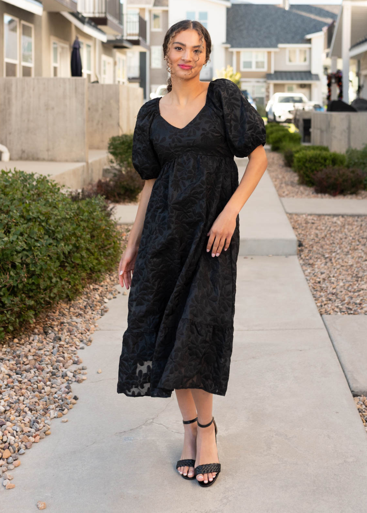 Black tiered flroal dress with short sleeves and pockets