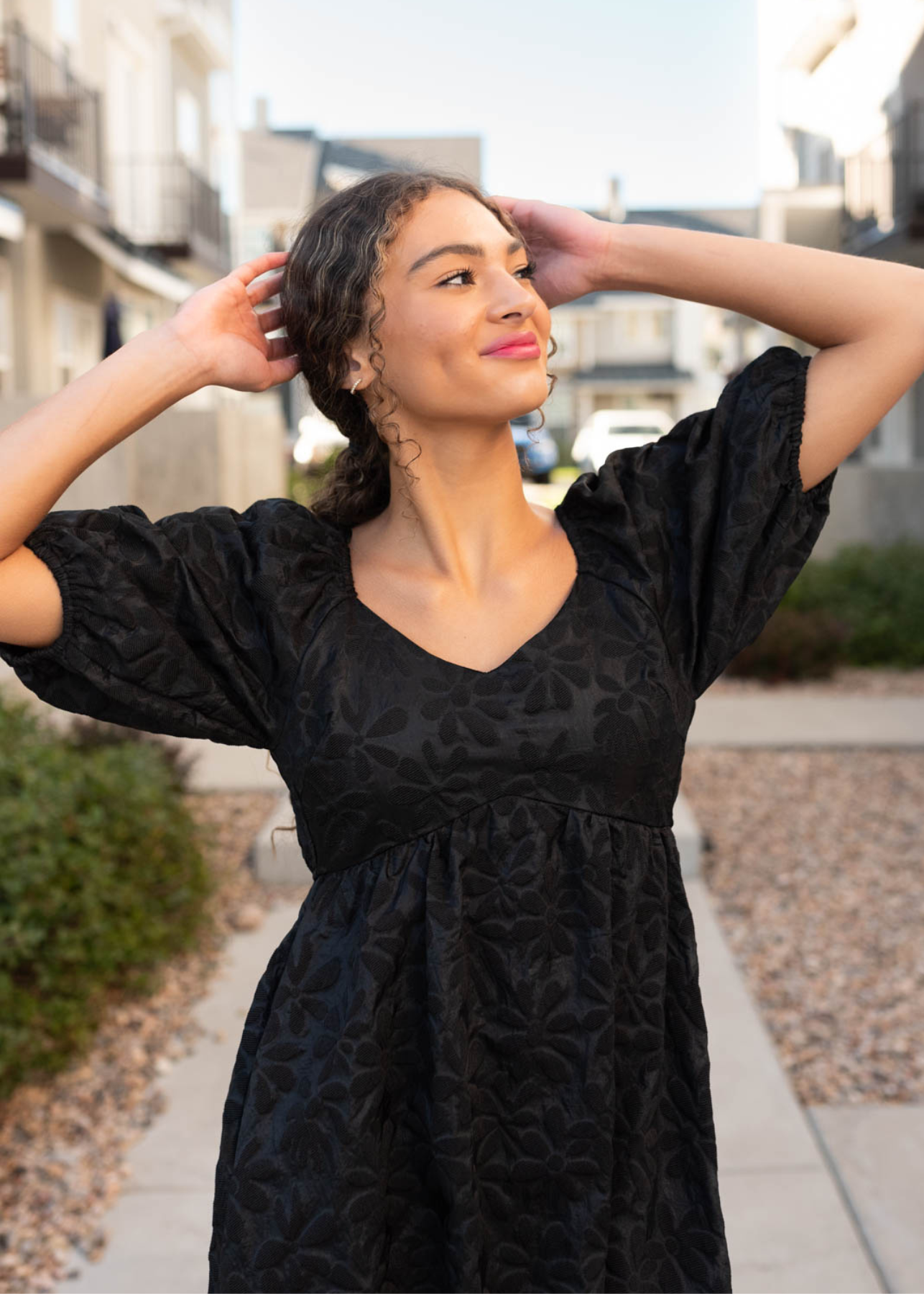 Black tiered floral dress with sweatheart neckline