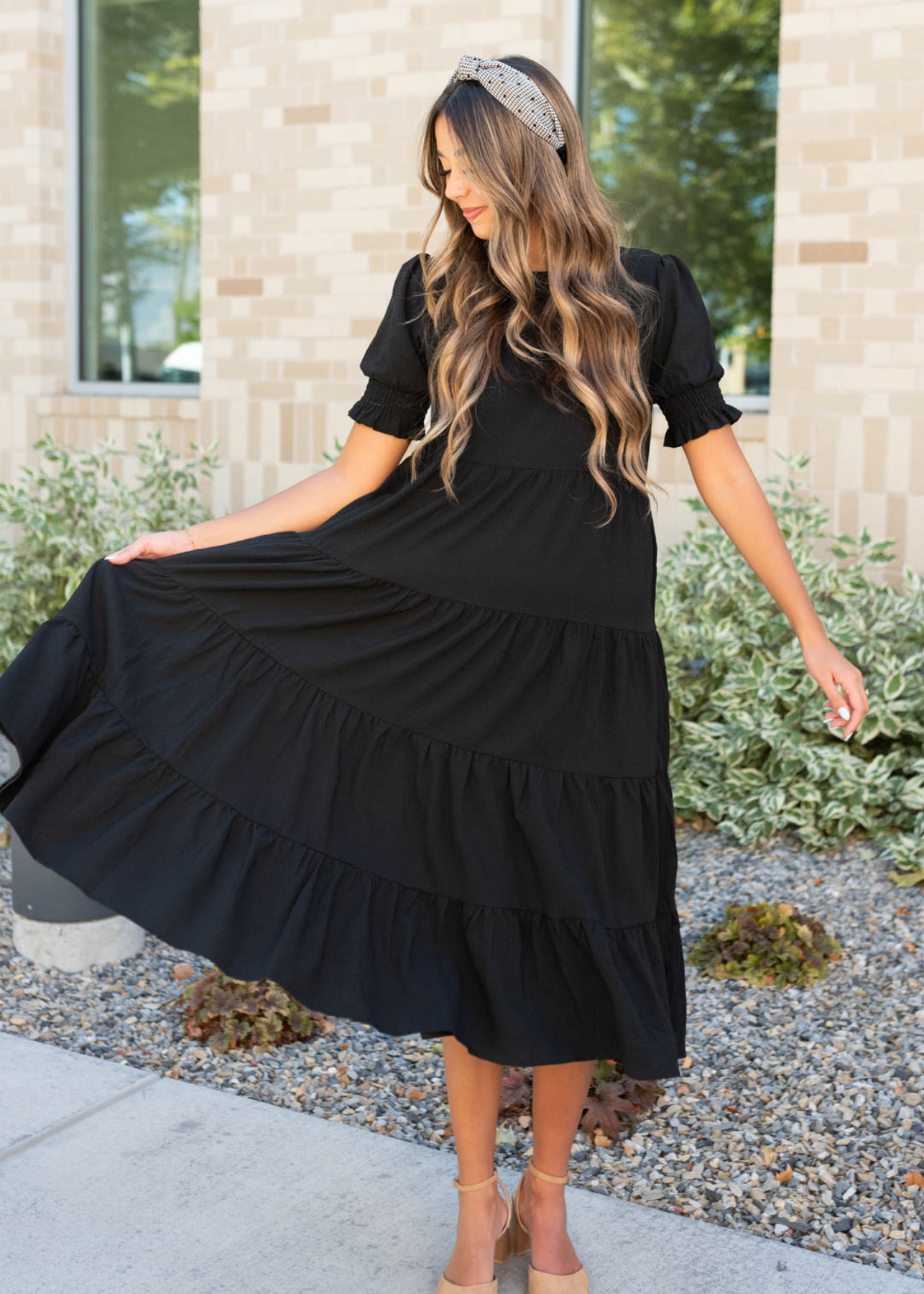 Short sleeve tiered black dress