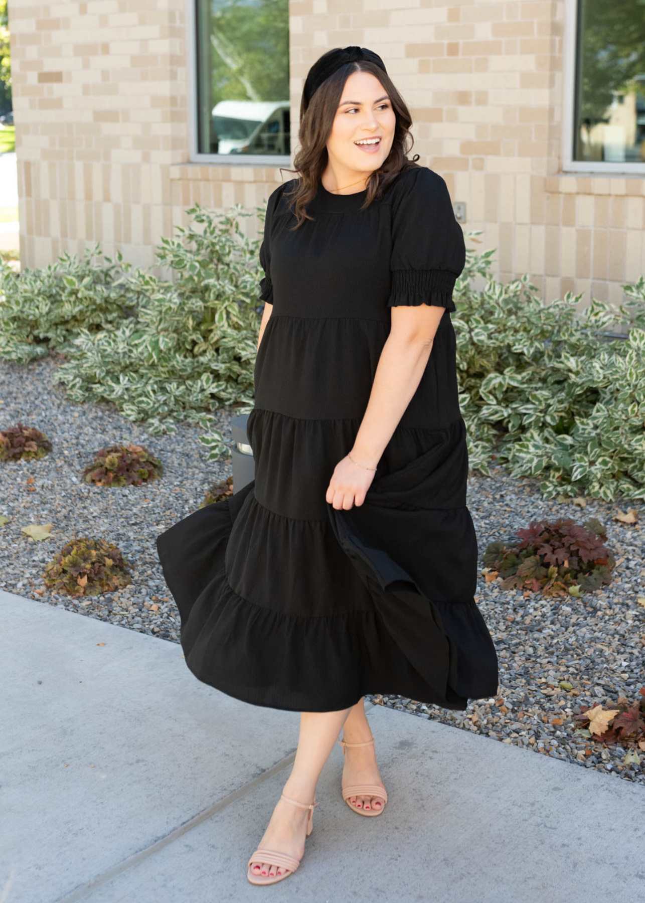 Short sleeve tiered black dress in plus size