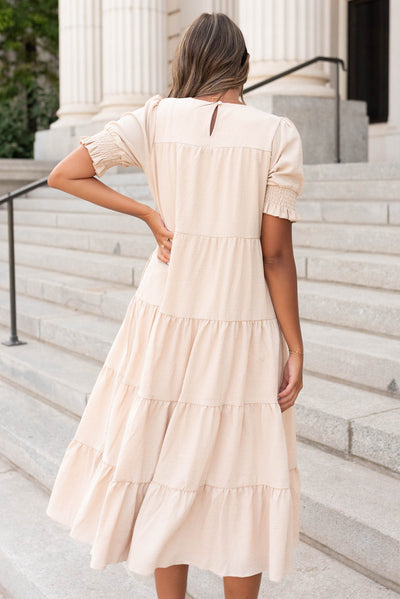 Back view of the tiered cream dress