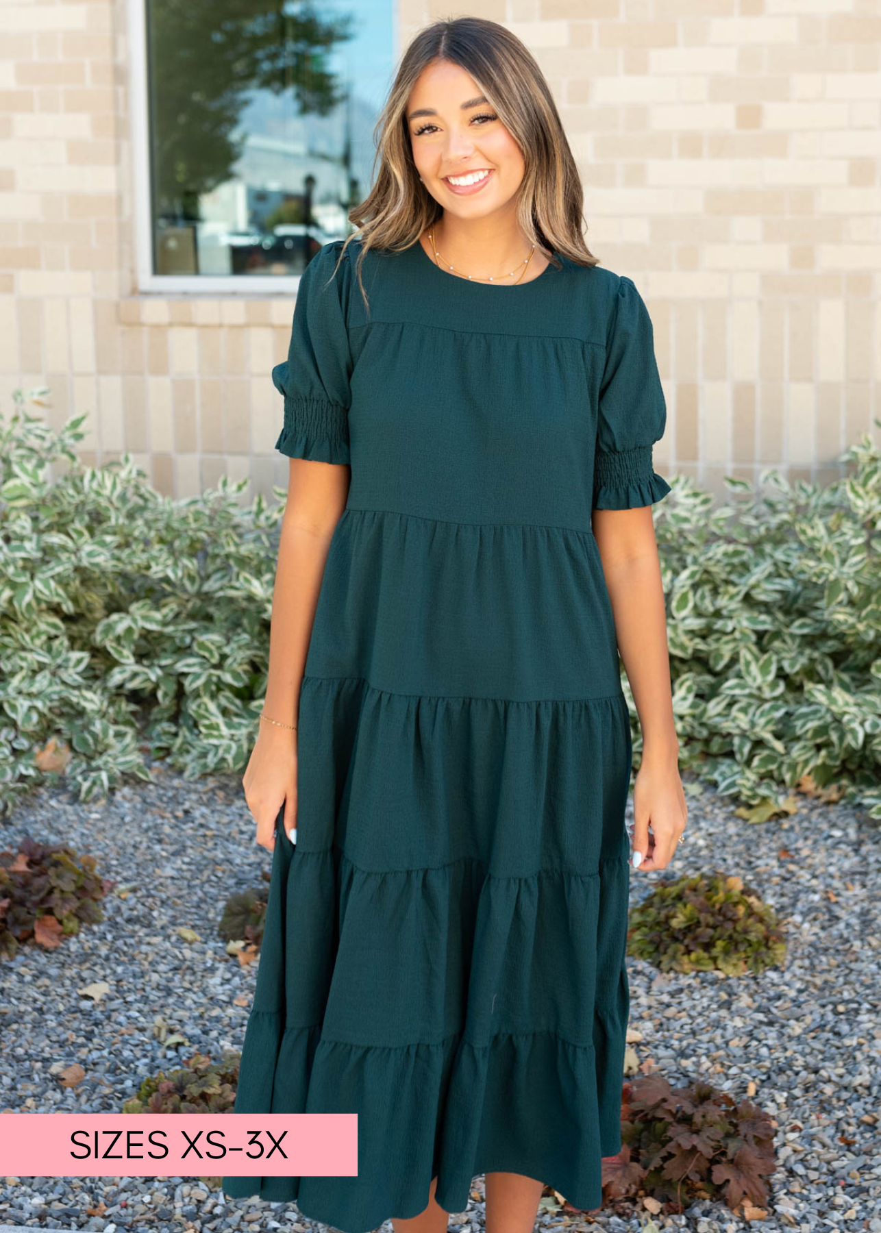 Small tiered dark green dress