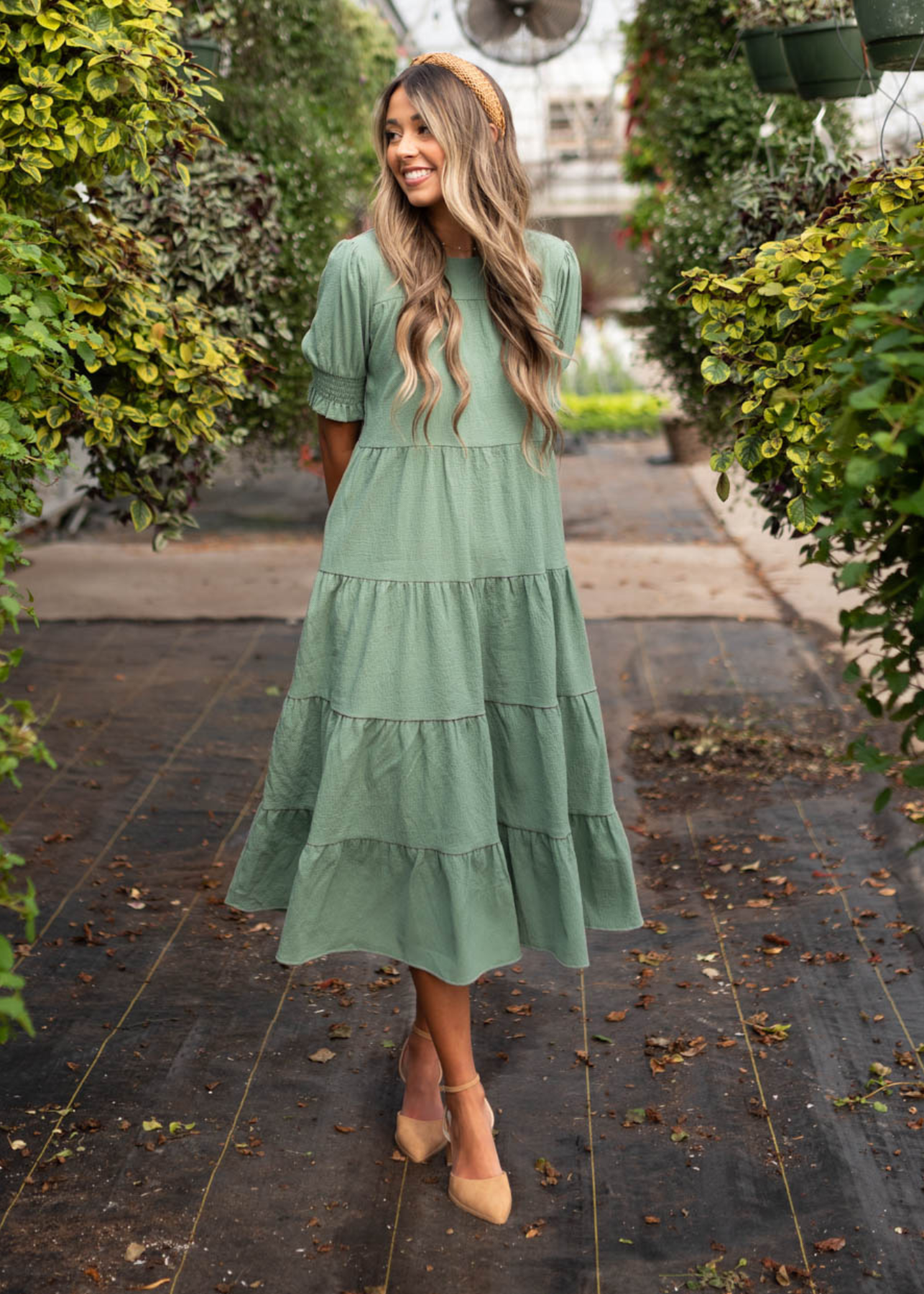 Tiered green dress that is mid length