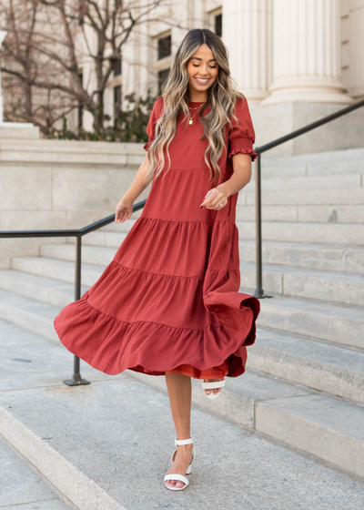 Short sleeve tiered rust dress