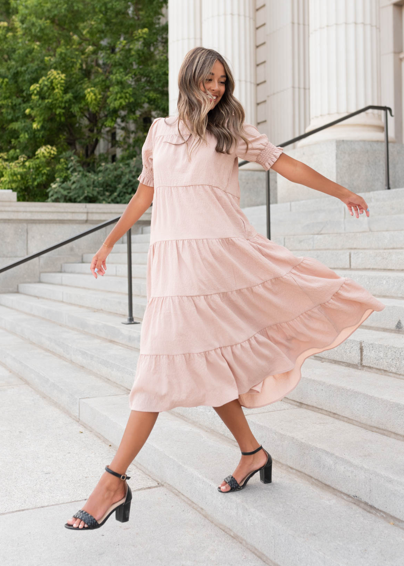 Twirl skirt on the tiered taupe dress