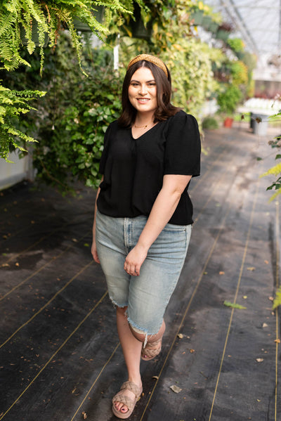 Plus size black top with a v-neck