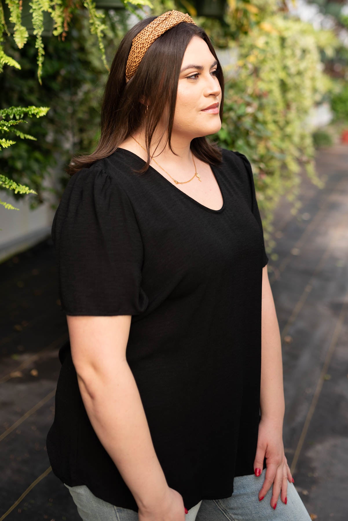 Side view of a plus size black top