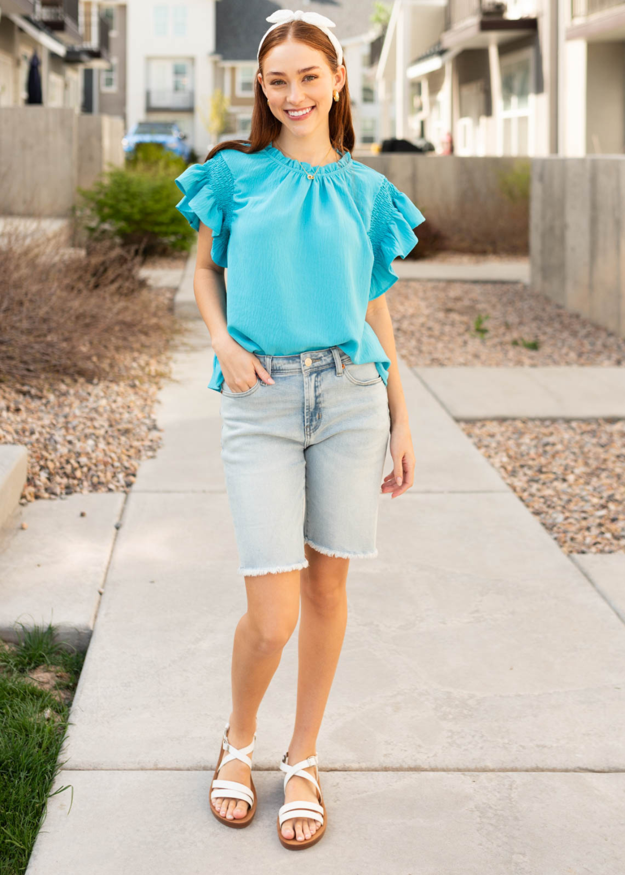 Short sleeve turquoise ruffle blouse