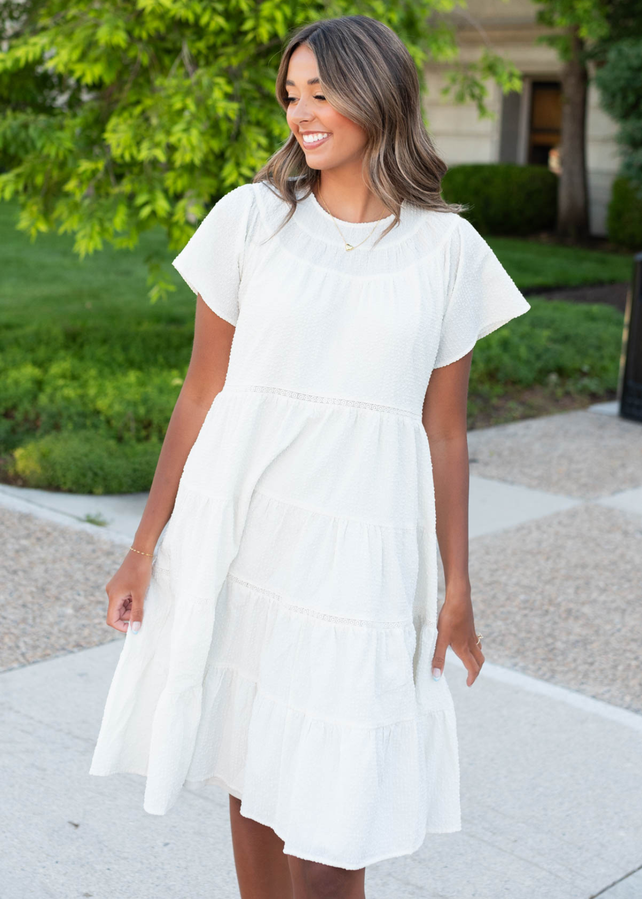 Ivory tiered dress with short sleeves