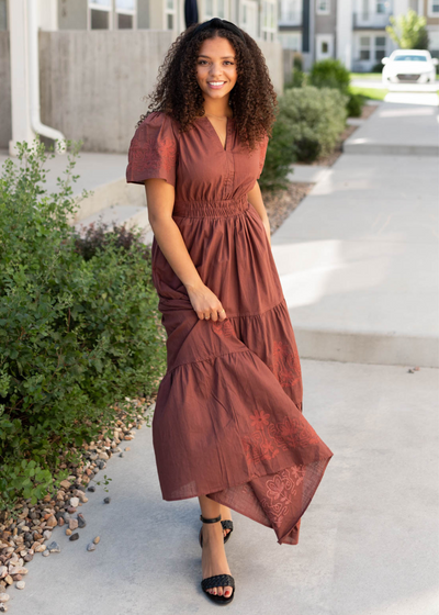 Burgundy embroidered detail dress with embrodery on the sleeves and skirt