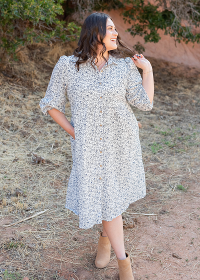 Plus size blue floral button dress with short sleeves