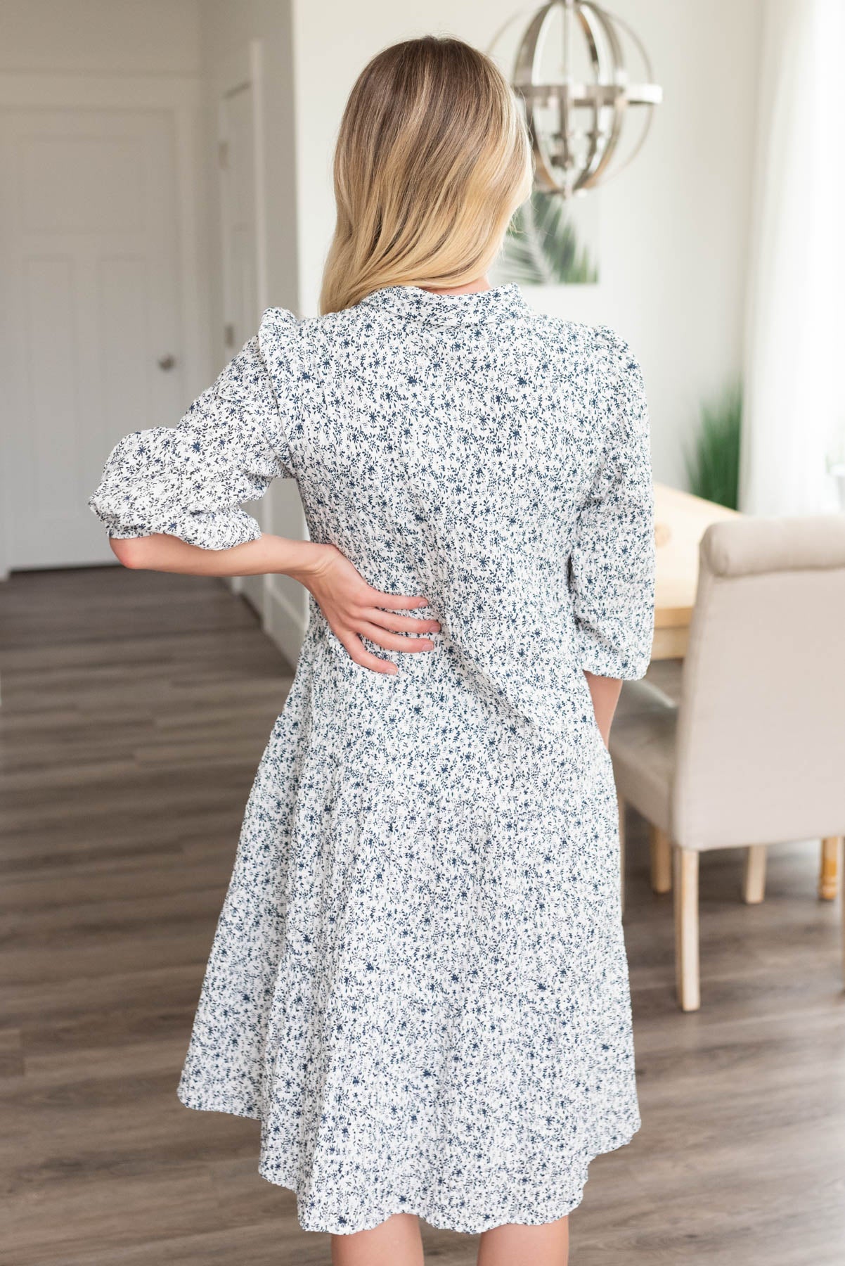 Back view of the blue floral button dress