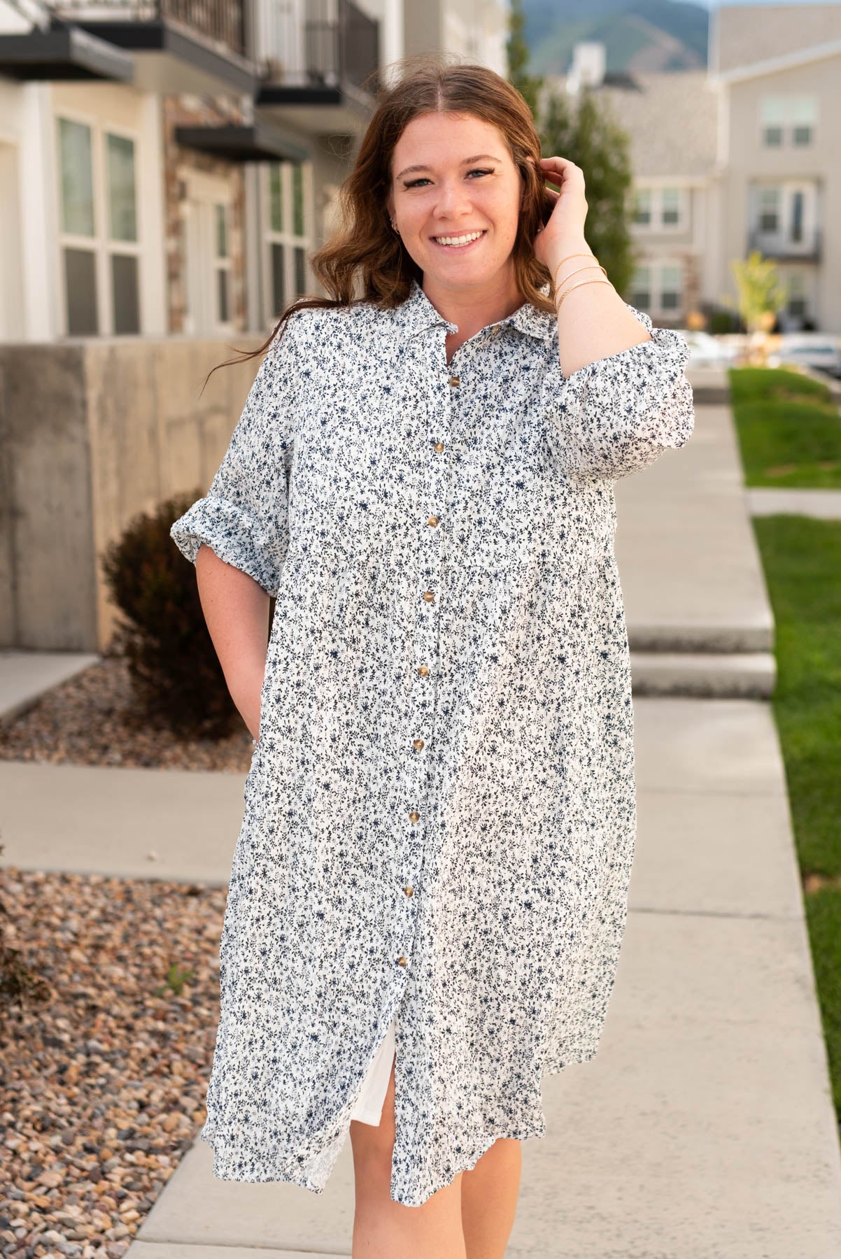 Plus size of the blue flroal button dress