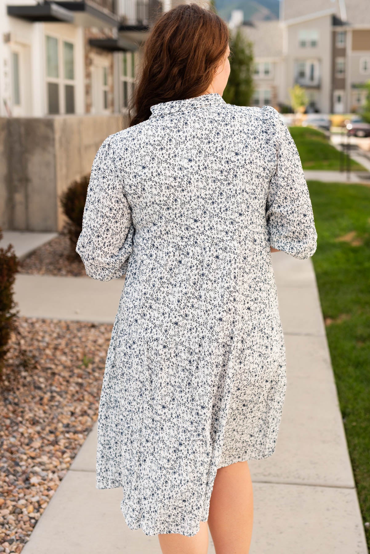 Back view of the blue floral button dress