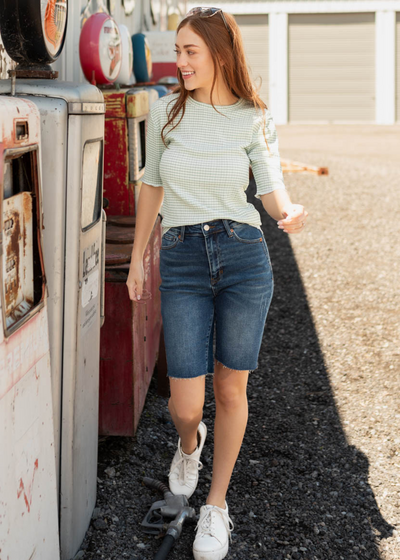 Sage plaid top with lettuces hem