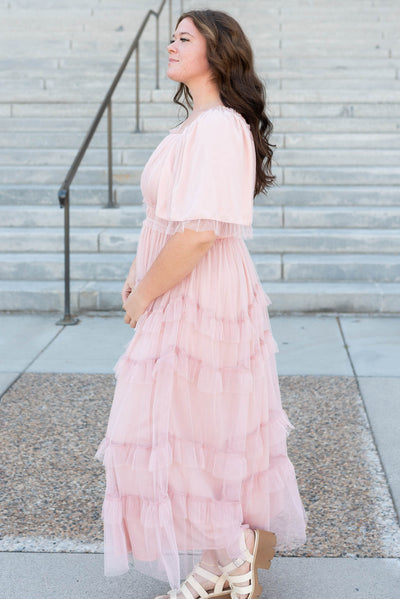 Side view of the plus size blush maxi dress