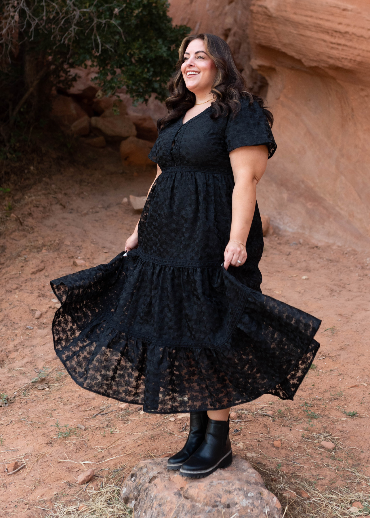 Side view of the plus size black floral lace dress