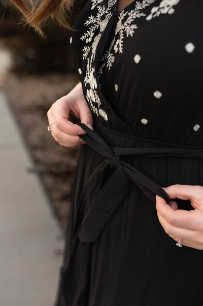 Black floral dress that ties at the waist