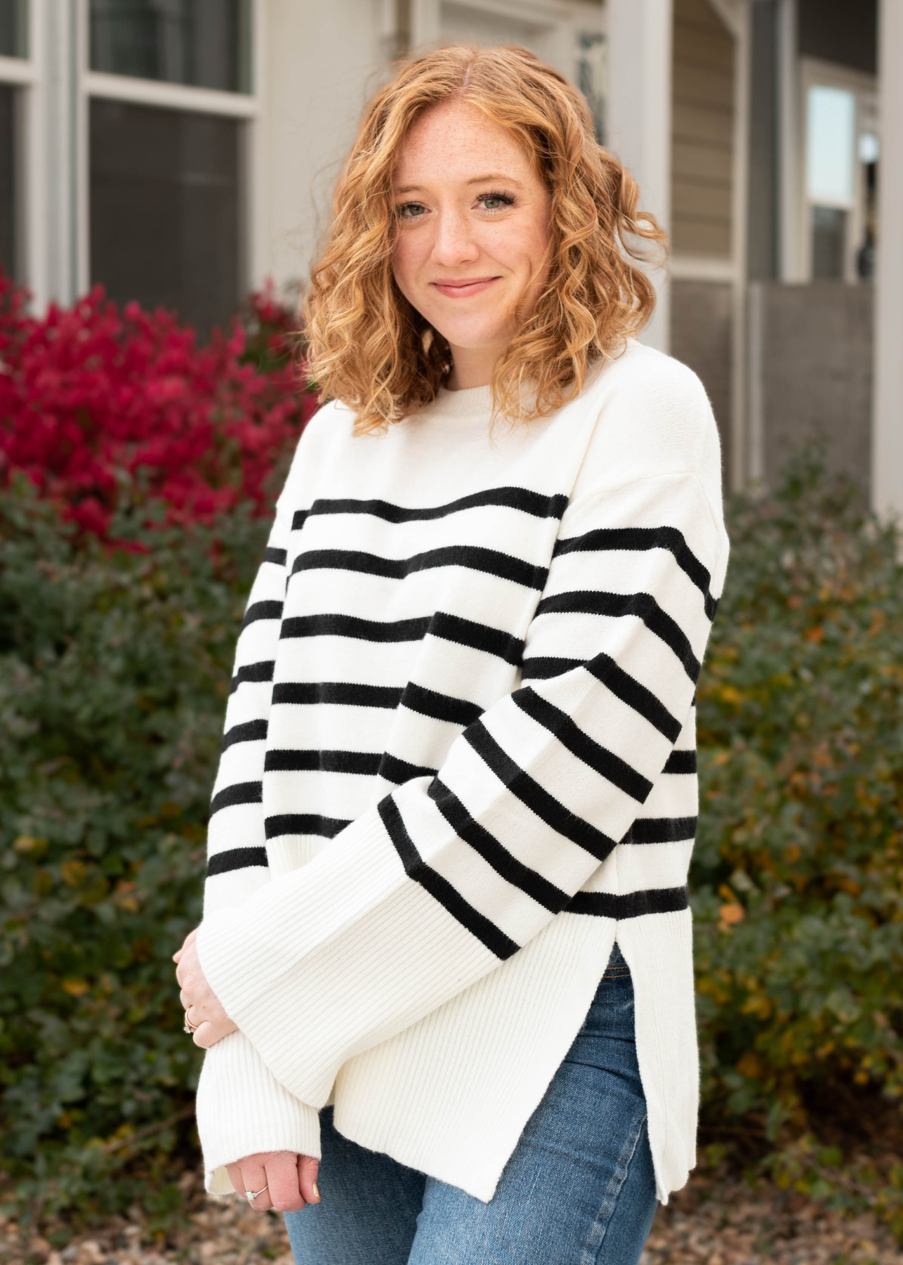 Ivory long sleeve stripped sweater with slits on the side