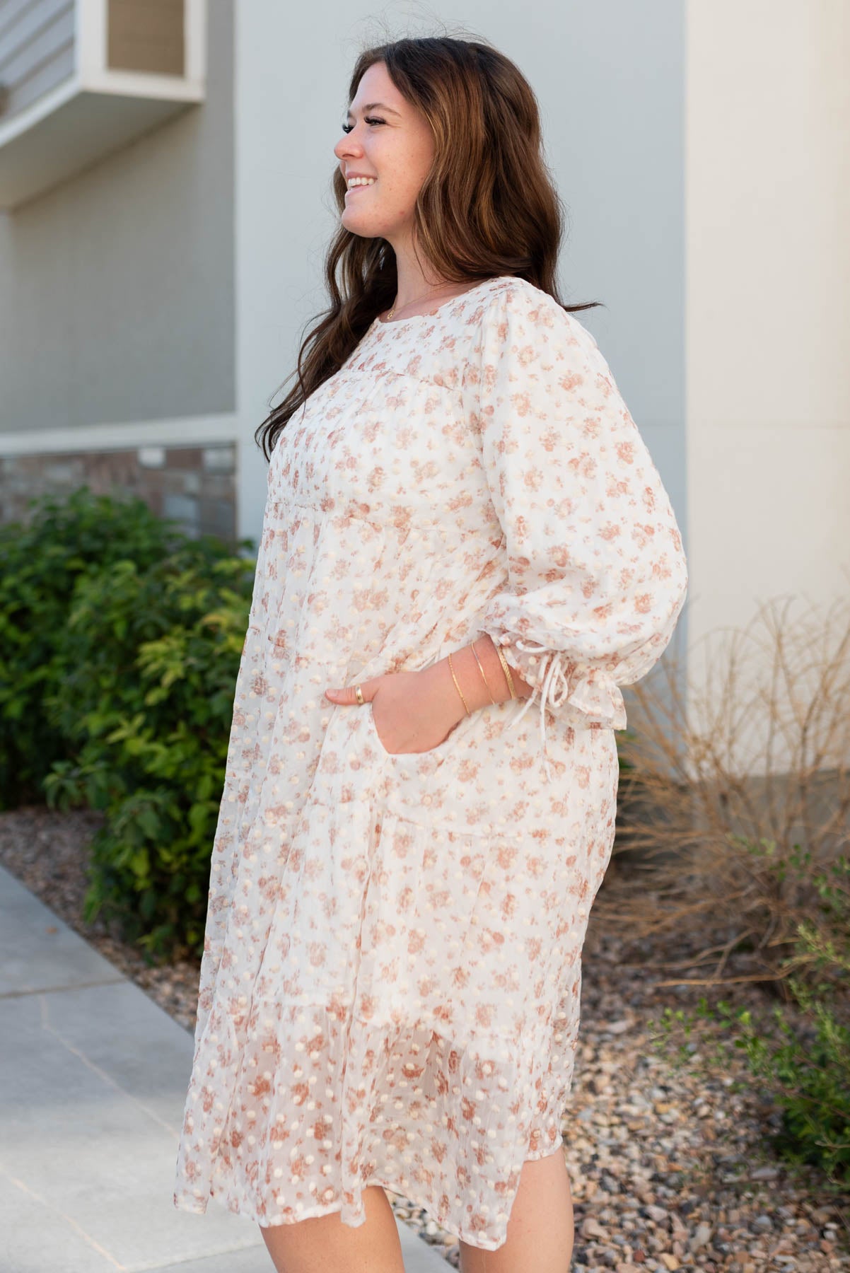 Side view of the cream floral dot dress