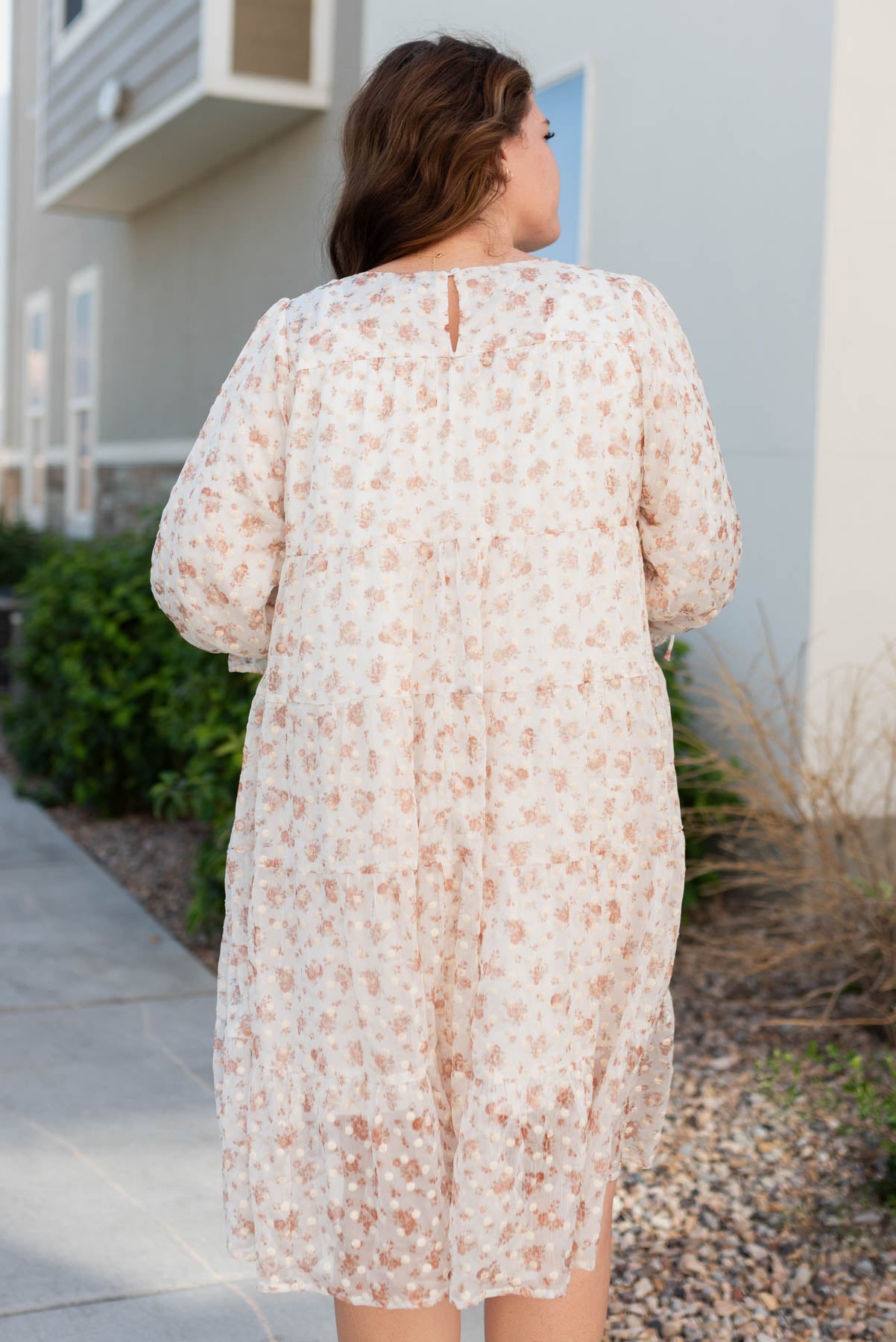 Back view of the plus size cream flroal dot dress