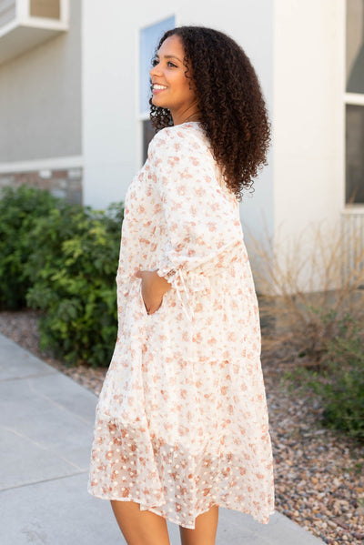 Side view of the cream floral dot dress