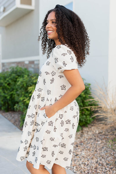 Side view of the white black floral dress