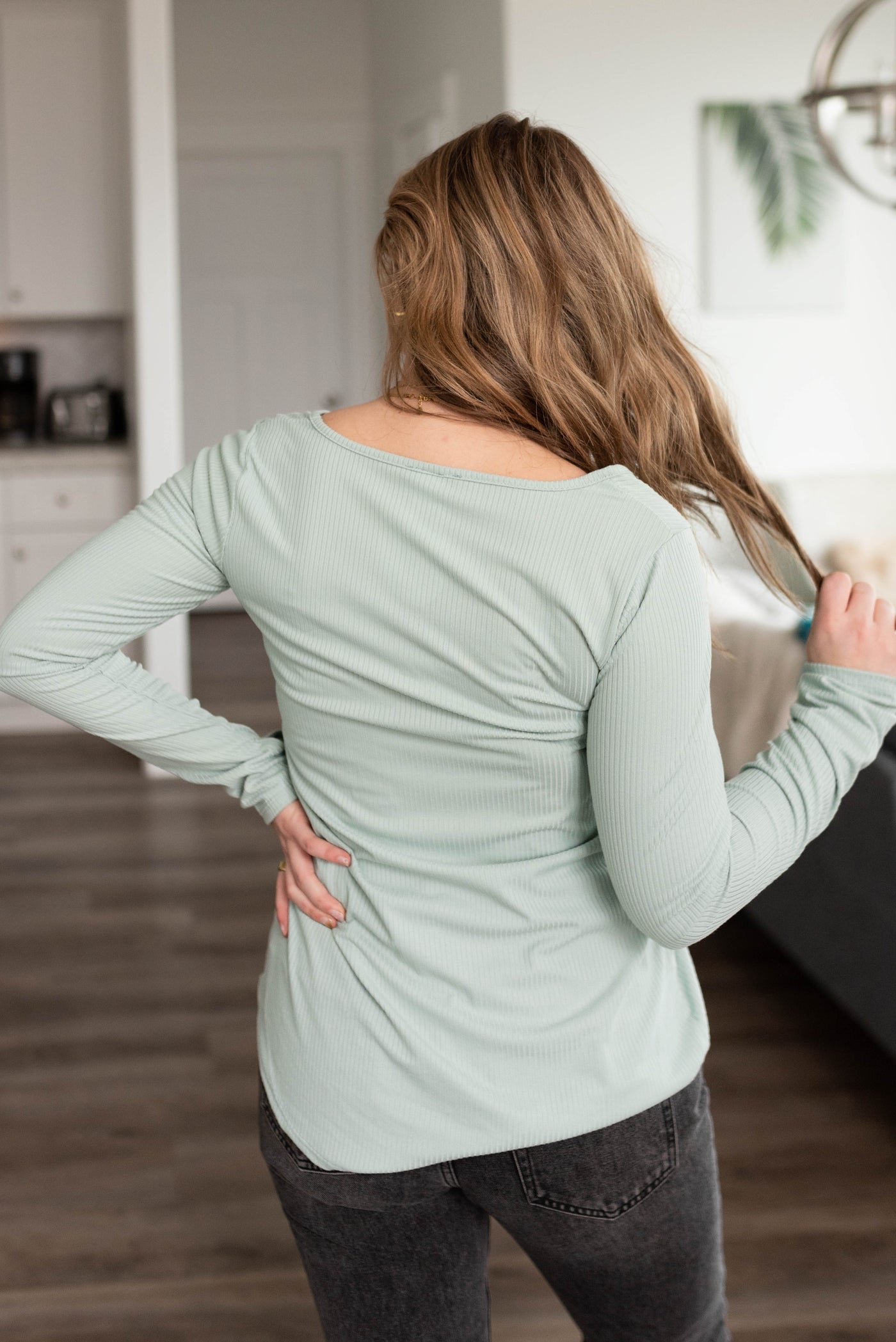 Back view of the sage ribbed long sleeve top