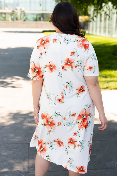 Back view of the plus size  ivory floral midi dress