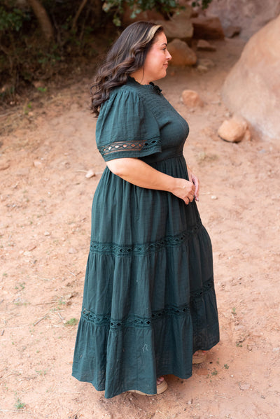 Side view of the hunter green dress in plus size