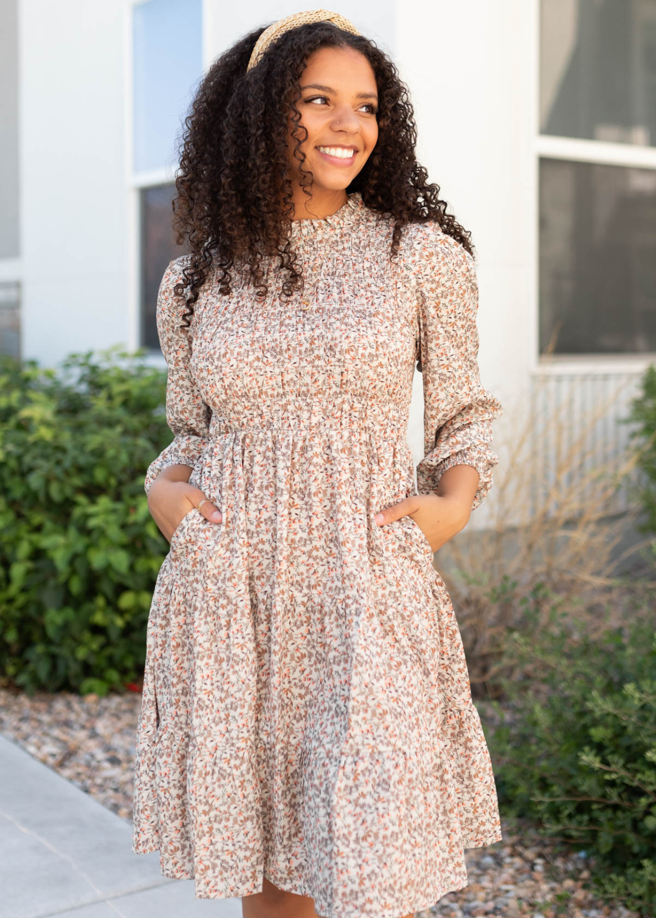 Beige floral smocked dress with long sleeves