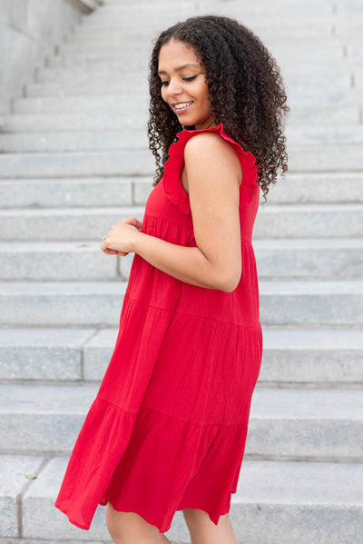 Side view of the red ruffle mini dress