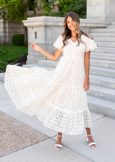 Cream floral lace dress with tiered skirt