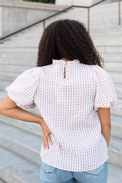 Back view of the latte gingham puff sleeve top