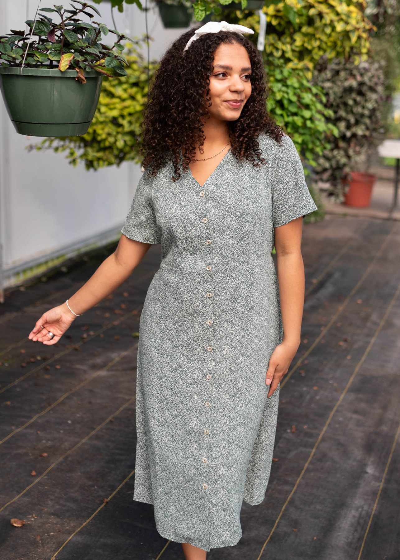 Short sleeve deep green button down dress with a v-neck