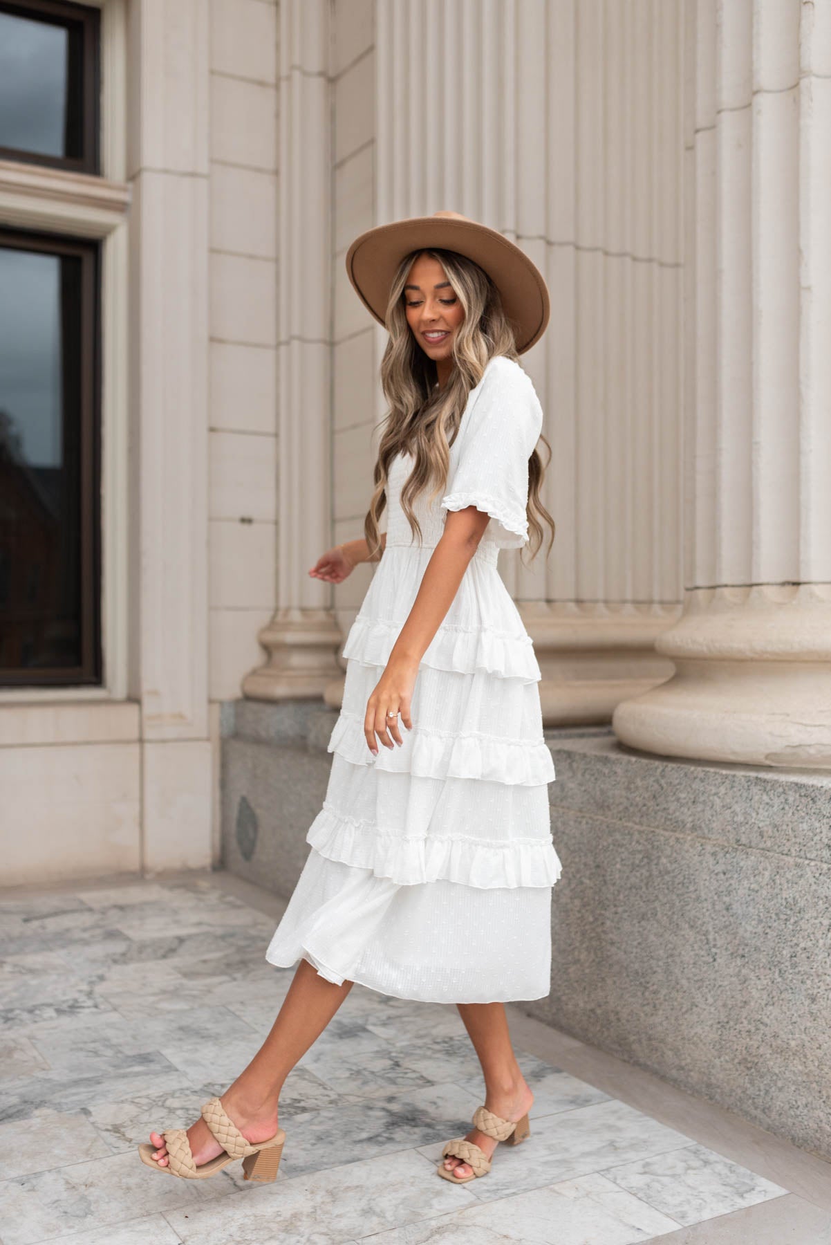 White tiered textured dress with smocked bodice and square neck