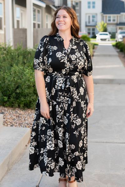 Plus size black floral button tiered dress with a tie at the waist