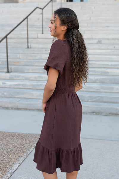 Side view of the brown textured dress