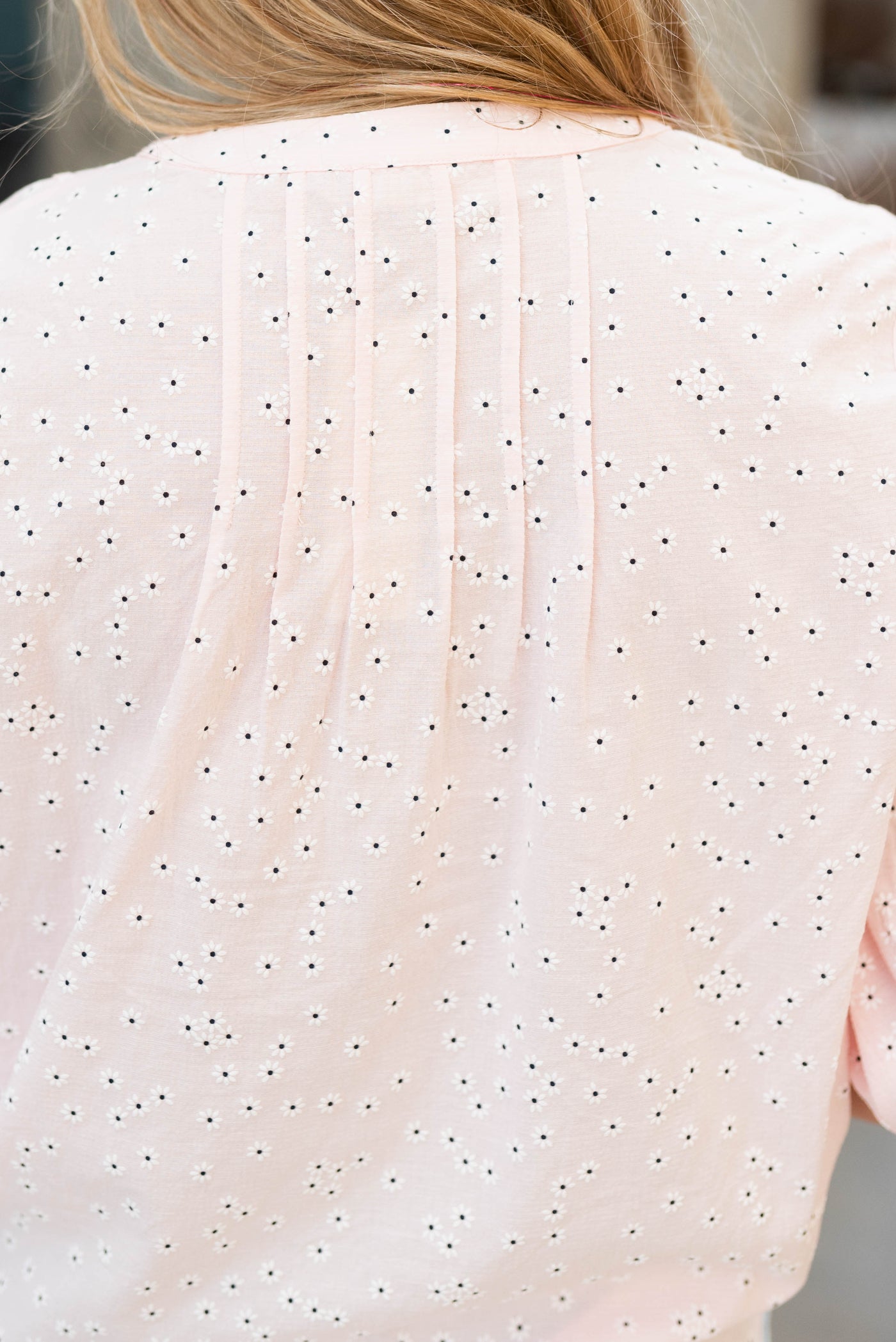 Back view of the pink floral woven blouse