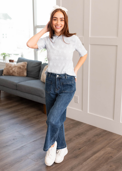 Dusty blue top with a mock turtleneck