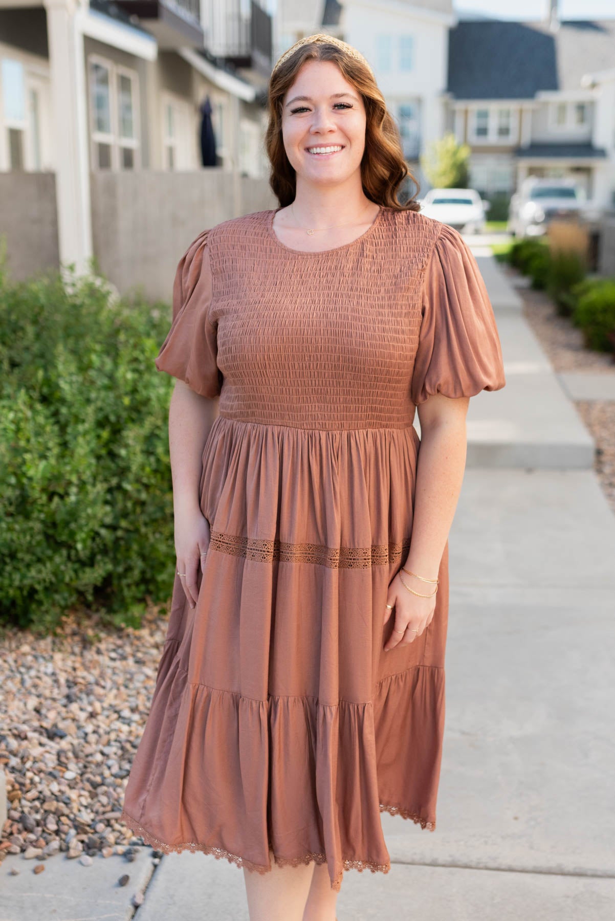 Plus size chestnut dress with lace trim on the skirt