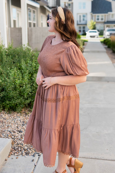 Side view of the plus size chestnut dress