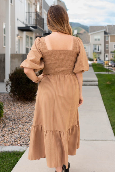 Back view of the taupe square neck dress