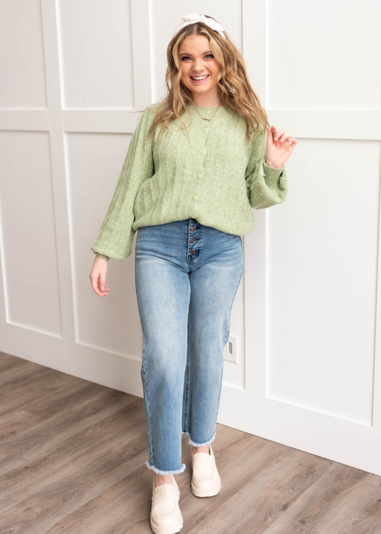 Light green puff sleeve sweater that buttons up