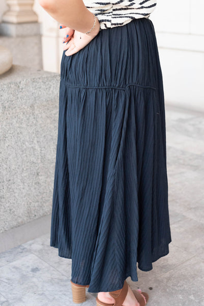 Side view of the navy maxi skirt