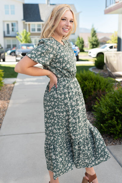 Side view of the dusty jade floral dress