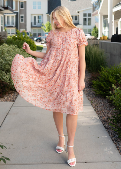 Tiered pink floral dress with short sleeves