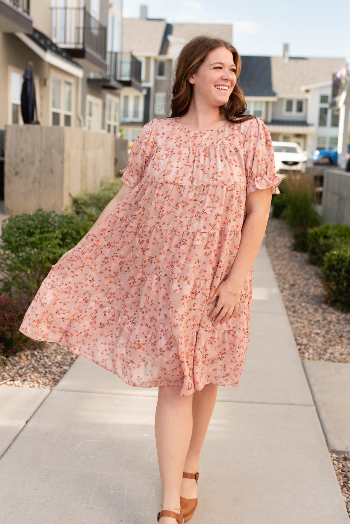 Front view of the plus size pink floral dress